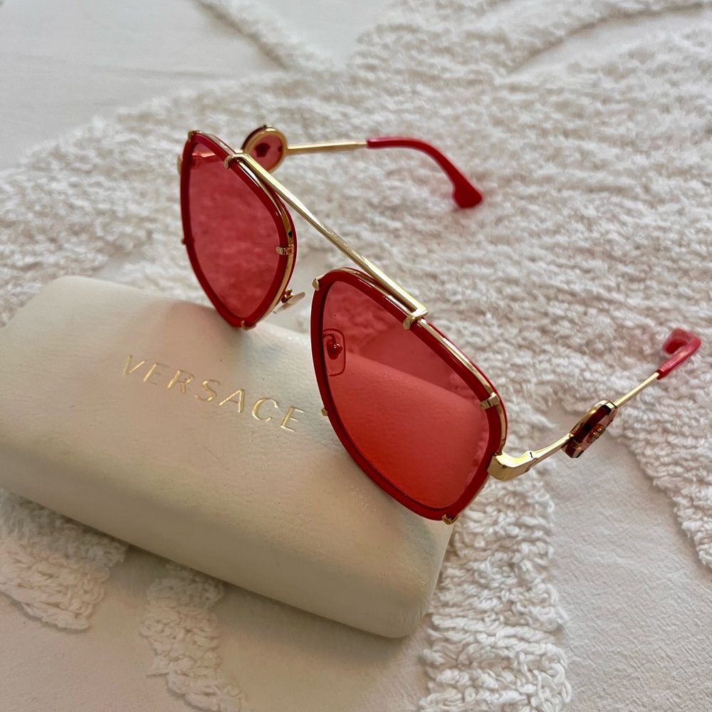 Bundle of versace sunnies and designer swimwear